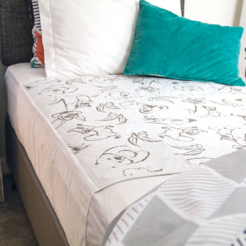 Reusable incontinence bed pads by Conni.